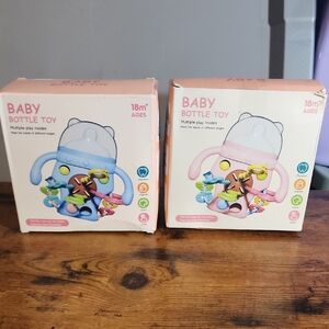 Baby Bottle Toy - 1 Blue And 1 Pink Interactive Rattle/ Bag Bottle Toy Price For